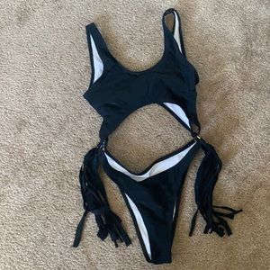Cutout one piece bathing suit with tassels